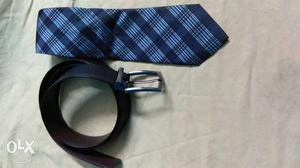 Black Leather Belt And Blue Plaid Neck Tie