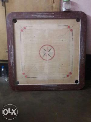 Brown And White Carrom Board with plastic carrom coins