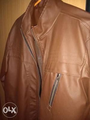 Brown leather jacket. In brand new condition. All