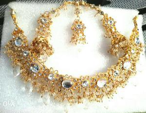 Gold plated White droplet necklace earring set at
