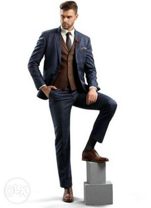 Men's Black Suit Jacket And Pants With Pair Of Brown Leather
