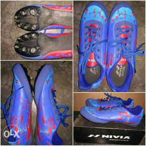 Pair Of Blue-and-red Nivia running shoes