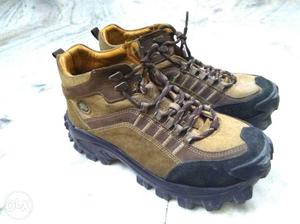 Pair Of Brown And Black Hiking Shoes