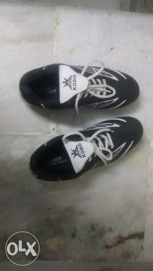 Pair of Kobo black n white shoes.not even used