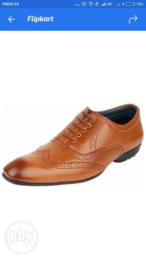 Paired Brown Leather Dress Shoe