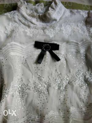 Princess white Top with cute bow. only 2 times used. almost