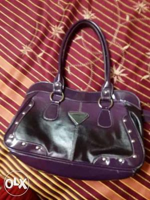 Purple hand bag