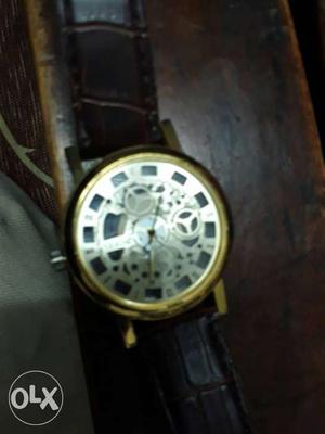 Round Gold And Silver Mechanical Watch