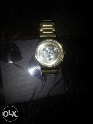 Round Gold Framed Chronograph Watch With Gold Link Bracelet