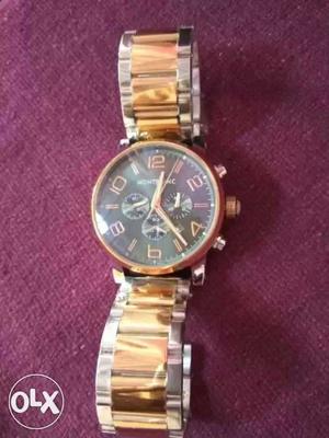 Round Silver And Gold Chronograph Watch With Link Bracelet