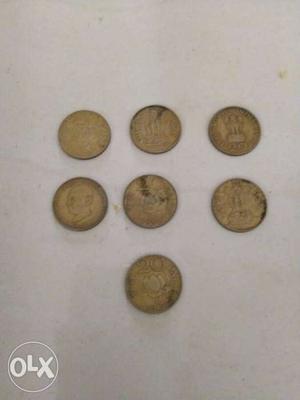 Seven Gold Indian Coins