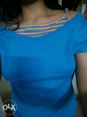 Stylish blue top. with drop shoulder.prices
