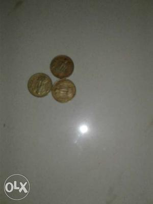 Three Round Bronze Coins
