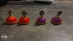 Two Pairs Of Red And Purple Jhumka Earrings