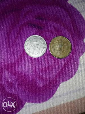 Two Round Silver And Gold Coins