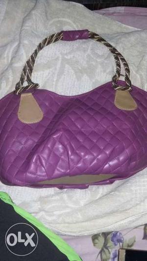 Womens hand bag... BRAND NEW purple pink handbag not even