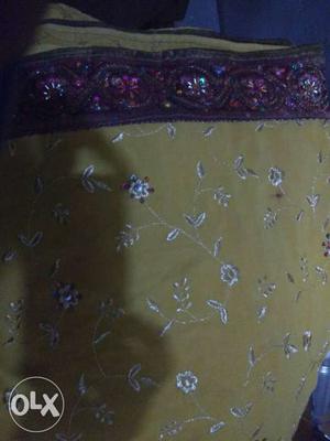 Yellow sari golden embroidery