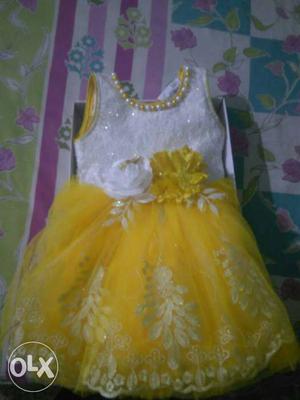 Baby Girl's White-and-yellow Floral Sleeveless Dress