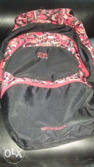 Black, Red And White Wildcraft Backpack