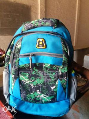 Blue, Green, And Black Backpack