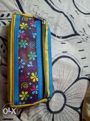 Blue, Purple, And Yellow Floral Pouch
