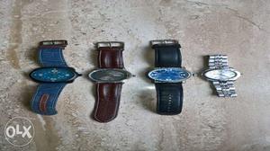 Four Round Silver Watches