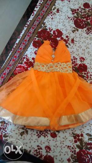 Net orange 1 yr baby frock