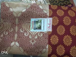 New Silk double bed bedsheet with 2 Pillows.