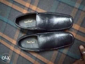 Pair Of Black Run Fast Leather Slip On Dress Shoes