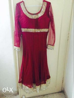 Red Anarkali suit. Beautiful design. Size is 34