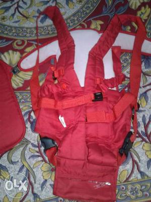 Red And White Baby's Carrier