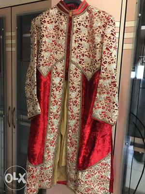 Red and gold wedding sherwani.. worn only once..