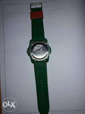 Round Silver Fastrack Watch With Green Strap