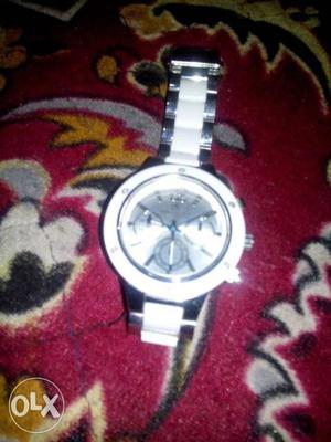 Round White Chronograph Watch With White And Silver Link