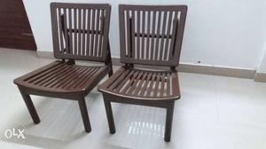 2 Brown Wooden Easy Chairs..