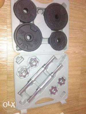 Black And Gray Dumbbells In Case. Price Negotiable