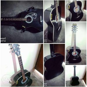 Black Gibson Dreadnought Acoustic Guitar