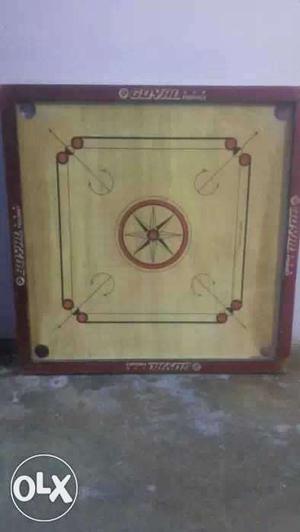Brown And Red Carom Board