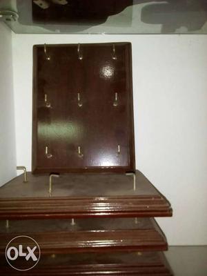 Brown Wooden Cabinet With Hooks