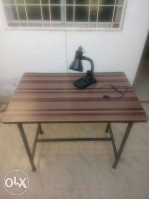 Brown Wooden Desk With Black Desk Lamp