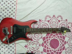 Electric guitar with cover at least price..brand