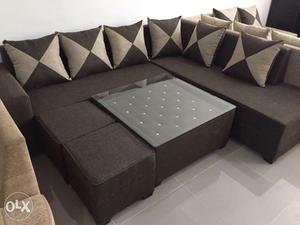 L sofa with center table and pouf