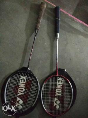 Pair Of White-red-and-brown Yonex Badminton Racket