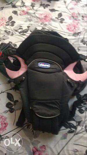Pink baby carrier bought from US, hardly used, in