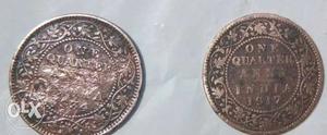 Two One Quarter Indian Coins