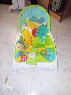 White And Green Bouncer Seat