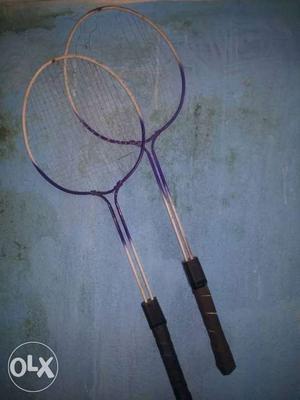 White And Purple Badminton Rackets