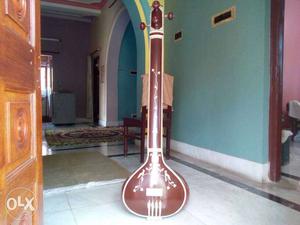 Brown And White Musical Instrument