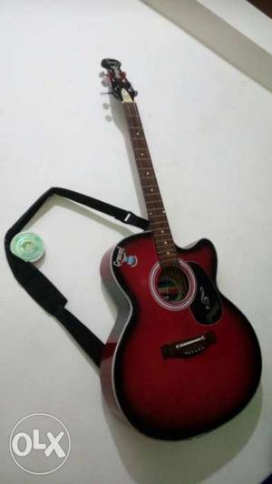 Red Black And Brown Acoustic Guitar