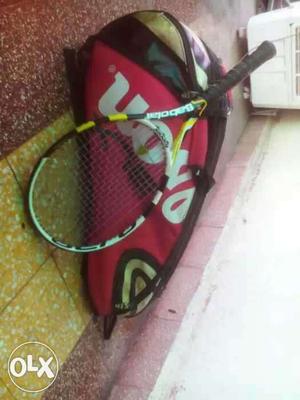 Tennis racket and kit bag